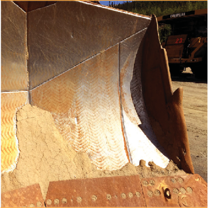 Material sloughing off a CCO RaptorPlate® chromium carbide overlay dozer blade liner